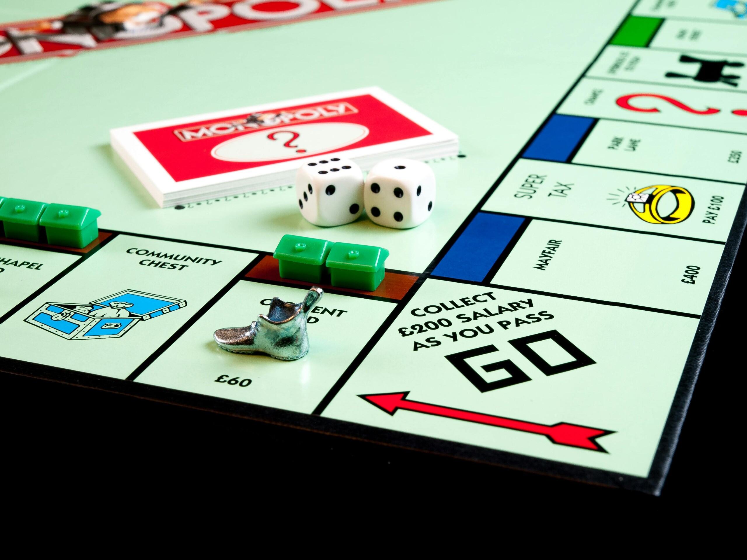 Person choosing between different budget app icons on a screen